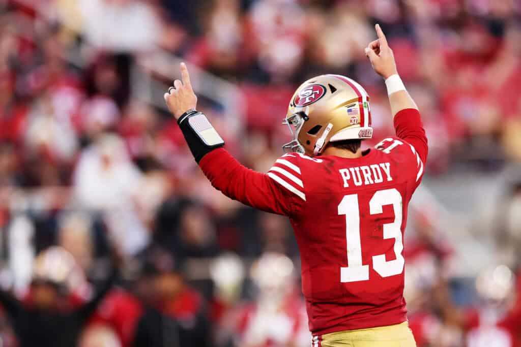SANTA CLARA, CALIFORNIA - DECEMBER 08: Brock Purdy #13 of the San Francisco 49ers celebrates after a fourth quarter touchdown against the Chicago Bears at Levi's Stadium on December 08, 2024 in Santa Clara, California.