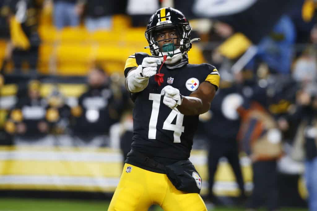 PITTSBURGH, PENNSYLVANIA - DECEMBER 23: George Pickens #14 of the Pittsburgh Steelers celebrates after scoring a touchdown during the thrid quarter of a game against the Cincinnati Bengals at Acrisure Stadium on December 23, 2023 in Pittsburgh, Pennsylvania