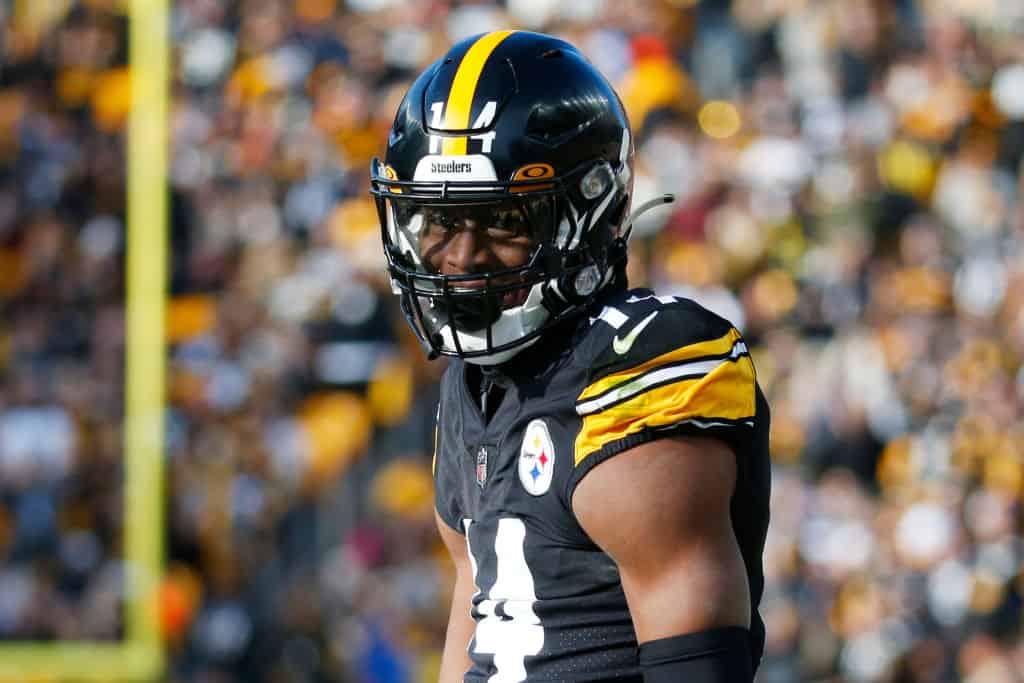 George Pickens #14 of the Pittsburgh Steelers looks on after scoring a touchdown during the second quarter of the game against the Cleveland Browns at Acrisure Stadium on January 08, 2023 in Pittsburgh, Pennsylvania.