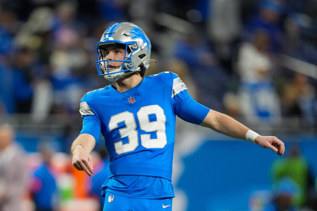 DETROIT, MICHIGAN - JANUARY 18: Jake Bates #39 of the Detroit Lions watches his kick during warmups prior to playing the Washington Commanders during the NFC Divisional Playoff at Ford Field on January 18, 2025 in Detroit, Michigan.