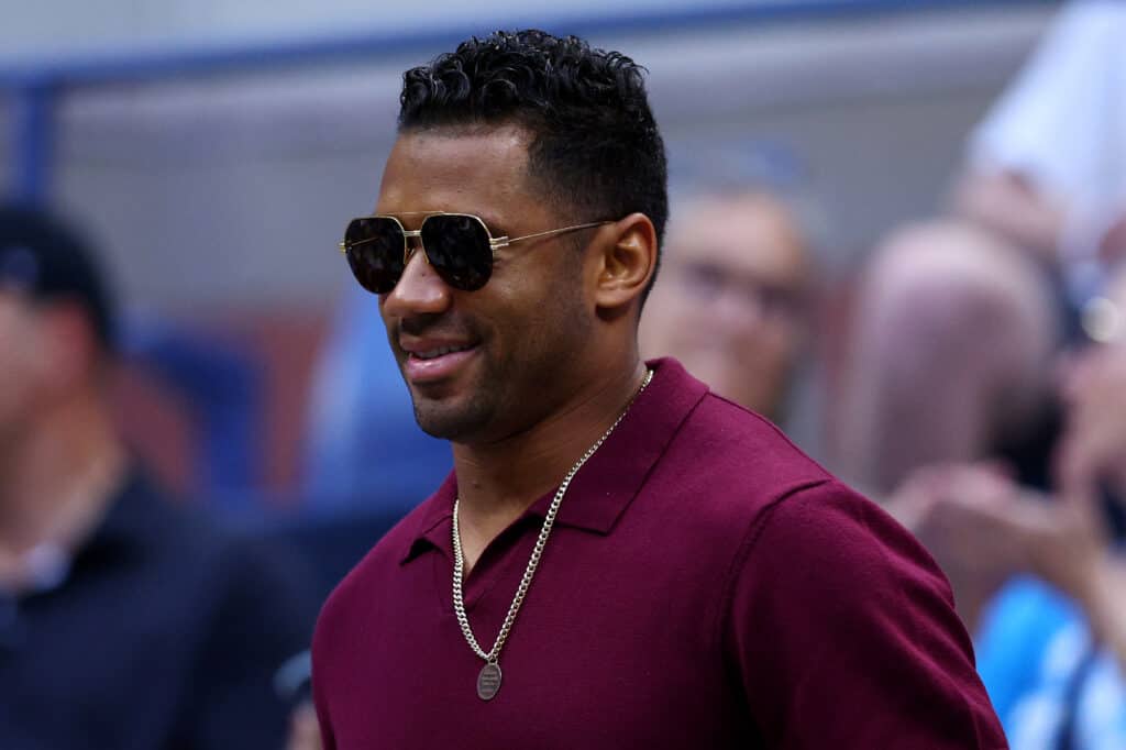Russell Wilson of the Denver Broncos looks on