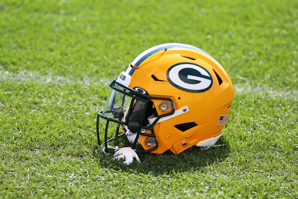 A Green Bay Packers helmets sits in the sunshine during Green Bay Packers Training Camp at Ray Nitschke Field on July 27, 2019 in Ashwaubenon, WI.