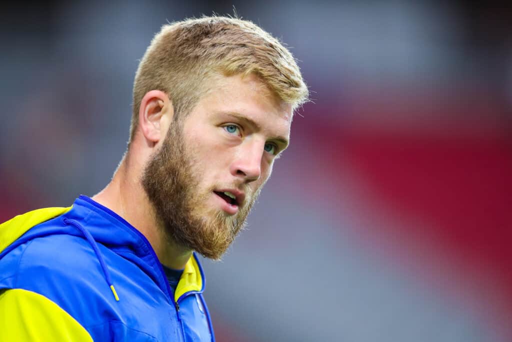 Cooper Kupp #10 of the Los Angeles Rams looks on during warmups before the NFL game at State Farm Stadium on September 25, 2022 in Glendale, Arizona.