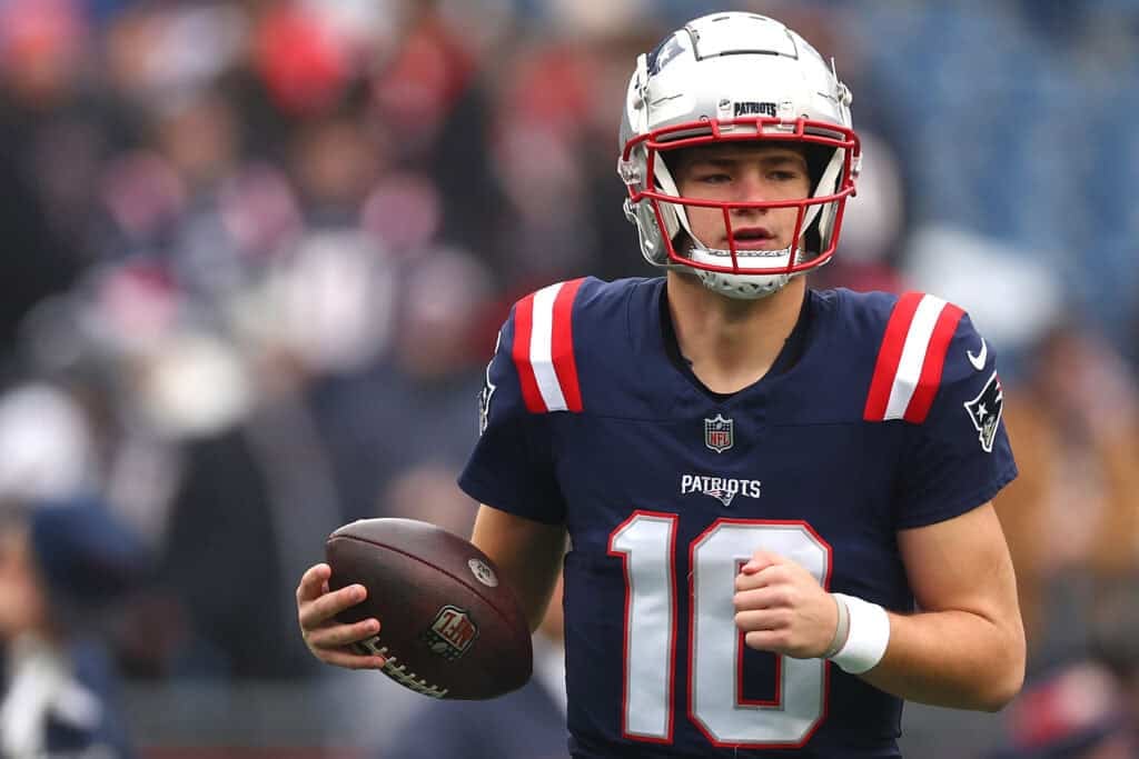 FOXBOROUGH, MASSACHUSETTS - DECEMBER 28: Drake Maye #10 of the New England Patriots warms up before the game against the Los Angeles Chargers at Gillette Stadium on December 28, 2024 in Foxborough, Massachusetts.
