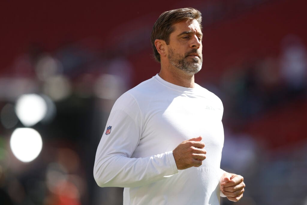 SANTA CLARA, CALIFORNIA - SEPTEMBER 09: Quarterback Aaron Rodgers #8 of the New York Jets warms up before taking on the San Francisco 49ers at Levi's Stadium on September 09, 2024 in Santa Clara, California.