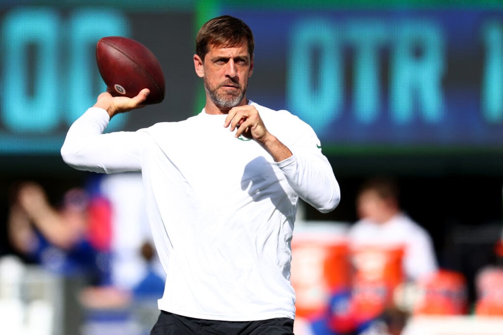 EAST RUTHERFORD, NEW JERSEY - AUGUST 26: Aaron Rodgers #8 of the New York Jets warms up prior to the game against the New York Giants at MetLife Stadium on August 26, 2023 in East Rutherford, New Jersey.