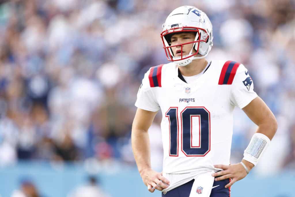 NASHVILLE, TENNESSEE - NOVEMBER 03: Drake Maye #10 of the New England Patriots looks on against the Tennessee Titans during the first quarter of the game at Nissan Stadium on November 03, 2024 in Nashville, Tennessee.