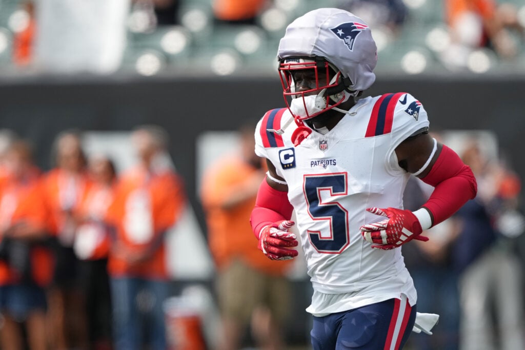 CINCINNATI, OHIO - SEPTEMBER 08: Jabrill Peppers #5 of the New England Patriots wears a Guardian Cap as he warms up before the game against the Cincinnati Bengals at Paycor Stadium on September 08, 2024 in Cincinnati, Ohio.