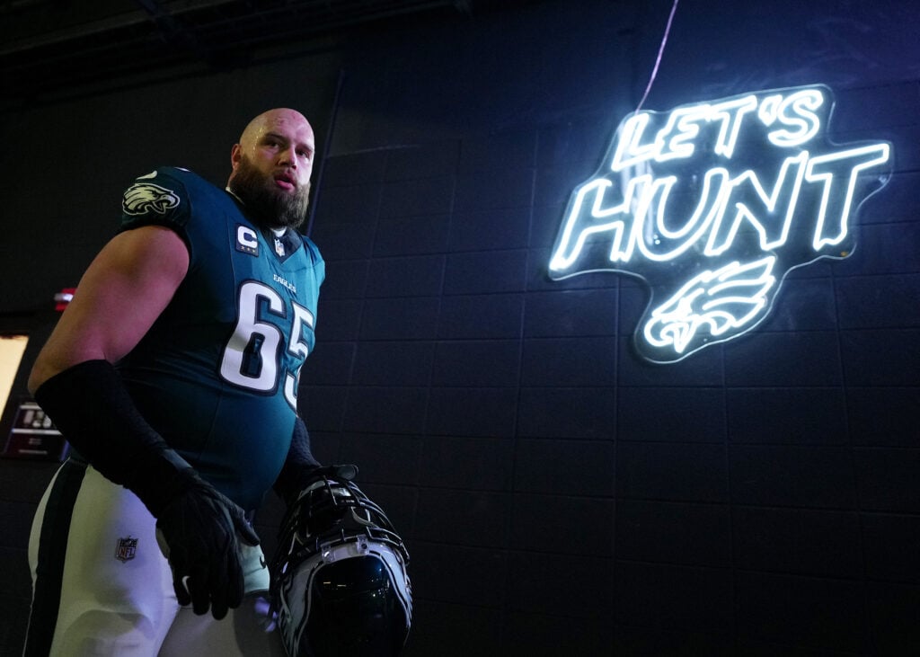 PHILADELPHIA, PENNSYLVANIA - JANUARY 12: Lane Johnson #65 of the Philadelphia Eagles looks on prior to a game against the Green Bay Packers during the NFC Wild Card Playoff at Lincoln Financial Field on January 12, 2025 in Philadelphia, Pennsylvania.