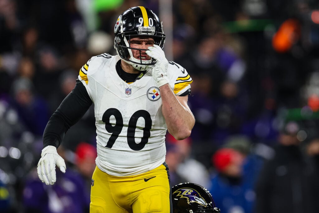BALTIMORE, MD - JANUARY 11: T.J. Watt #90 of the Pittsburgh Steelers reacts after a play against the Baltimore Ravens during the first half of the AFC Wild Card Playoff game at M&T Bank Stadium on January 11, 2025 in Baltimore, Maryland.
