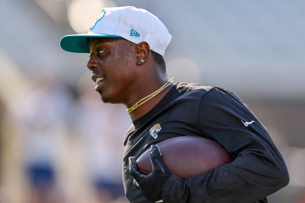 JACKSONVILLE, FLORIDA - AUGUST 17: Travis Etienne Jr. #1 of the Jacksonville Jaguars warms up against the Tampa Bay Buccaneers during a preseason game at EverBank Field on August 17, 2024 in Jacksonville, Florida.