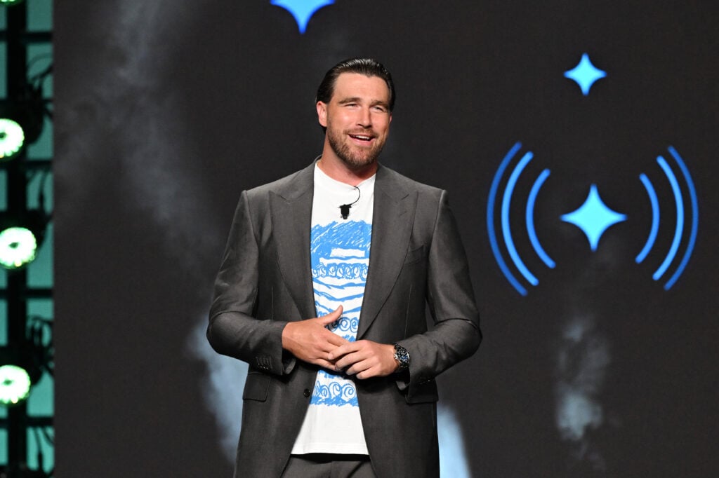 NEW YORK, NEW YORK - MAY 12: Travis Kelce speaks onstage during Amazon's Upfront 2025 Presentation at Beacon Theatre on May 12, 2025 in New York City.
