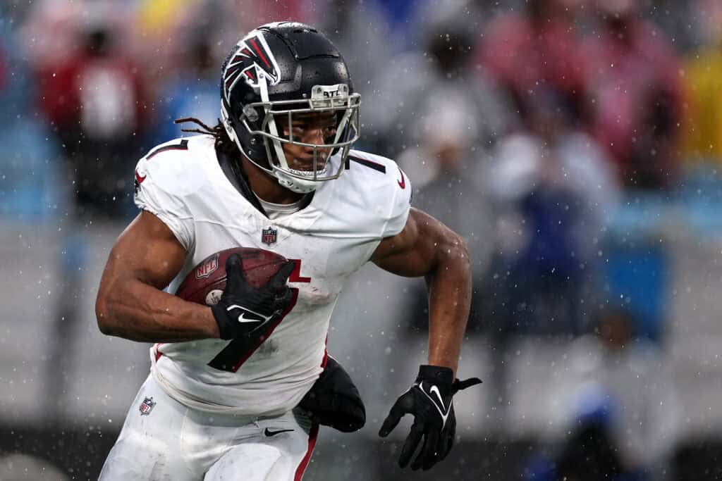 CHARLOTTE, NORTH CAROLINA - DECEMBER 17: Bijan Robinson #7 of the Atlanta Falcons carries the ball during the second half of the game against the Carolina Panthers at Bank of America Stadium on December 17, 2023 in Charlotte, North Carolina.
