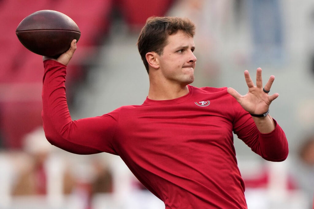 SANTA CLARA, CALIFORNIA - DECEMBER 30: Brock Purdy #13 of the San Francisco 49ers warms up before the game against the Detroit Lions at Levi's Stadium on December 30, 2024 in Santa Clara, California.