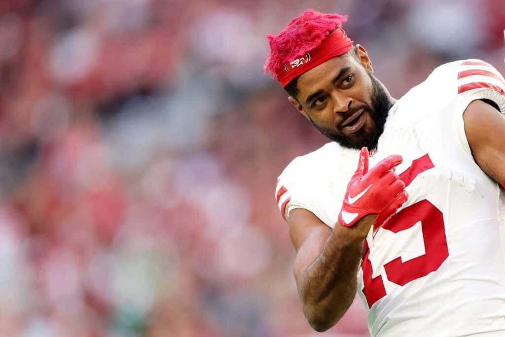 GLENDALE, ARIZONA - JANUARY 05: Jauan Jennings #15 of the San Francisco 49ers reacts after the play against the Arizona Cardinals during the second quarter at State Farm Stadium on January 05, 2025 in Glendale, Arizona.