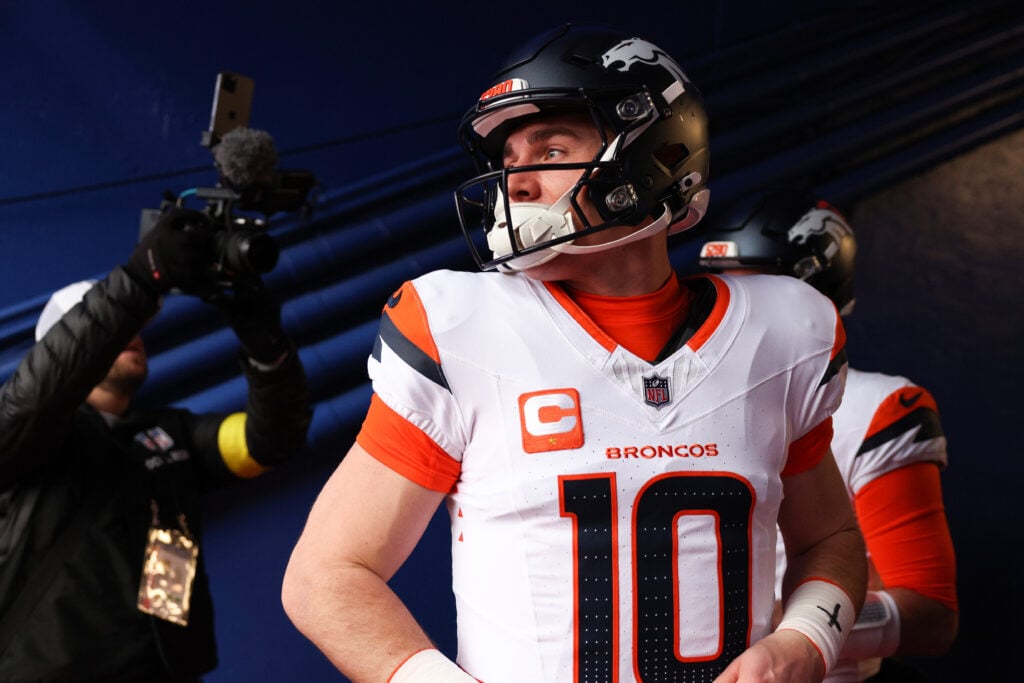 ORCHARD PARK, NEW YORK - JANUARY 12: Bo Nix #10 of the Denver Broncos takes the field prior to playing the Buffalo Bills during the AFC Wild Card Playoffs at Highmark Stadium on January 12, 2025 in Orchard Park, New York.