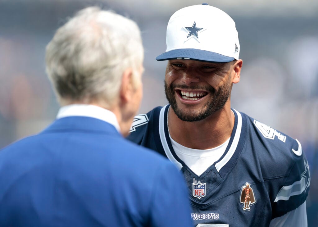 INGLEWOOD, CALIFORNIA - AUGUST 09: Dak Prescott #4 of the Dallas Cowboys talks with NFL owner Stan Kroenke before the NFL Preseason 2025 game between the Dallas Cowboys and Los Angeles Rams at SoFi Stadium on August 09, 2025 in Inglewood, California.