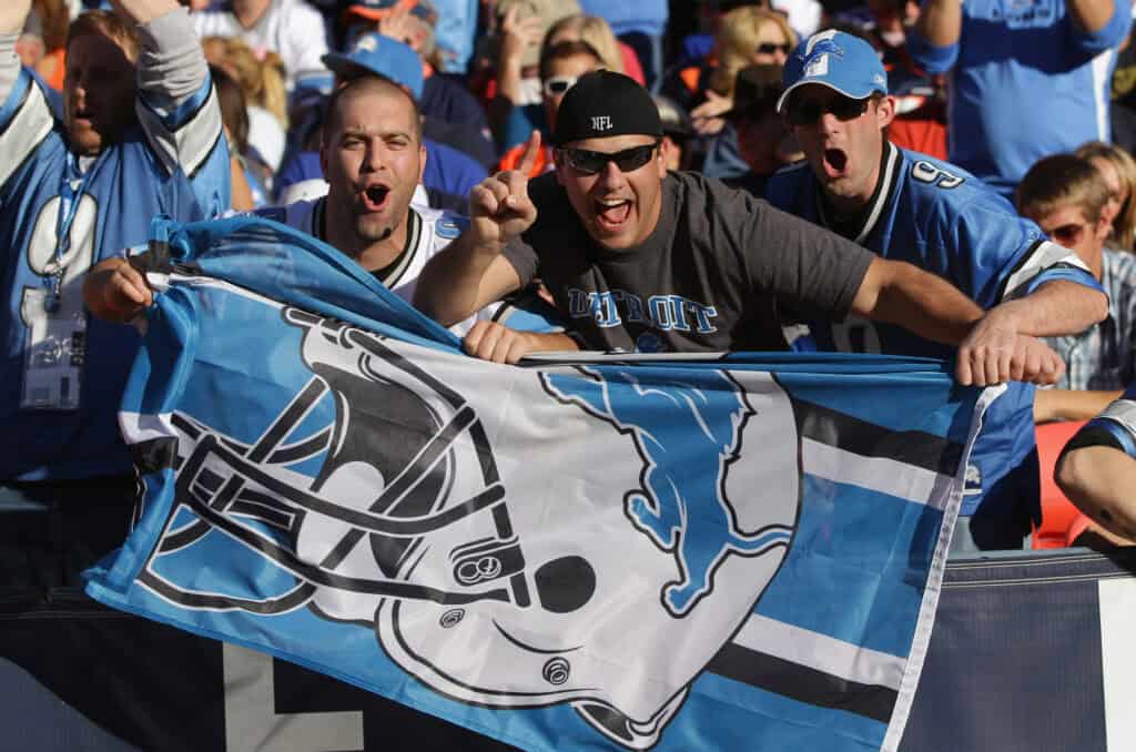 DENVER, CO - OCTOBER 30: Fans cheer in support of the Detroit Lions as they face the Denver Broncos Sports Authority at Invesco Field at Mile High on October 30, 2011 in Denver, Colorado. The Lions defeated the Broncos 45-10.