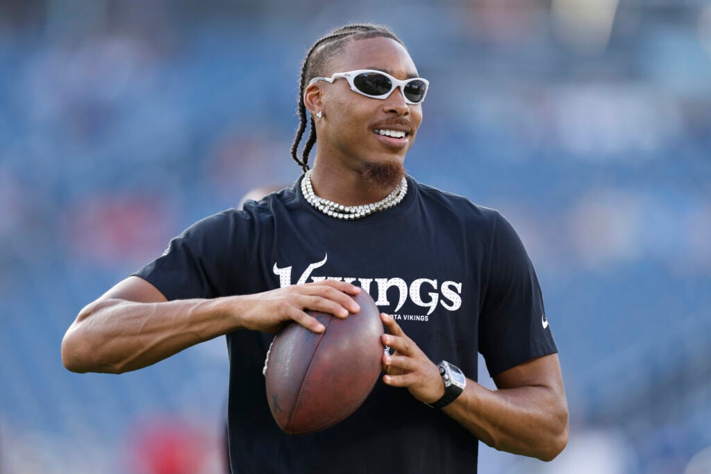 NASHVILLE, TENNESSEE - AUGUST 22: Justin Jefferson #18 of the Minnesota Vikings looks on prior to the NFL Preseason 2025 game against the Tennessee Titans at Nissan Stadium on August 22, 2025 in Nashville, Tennessee.