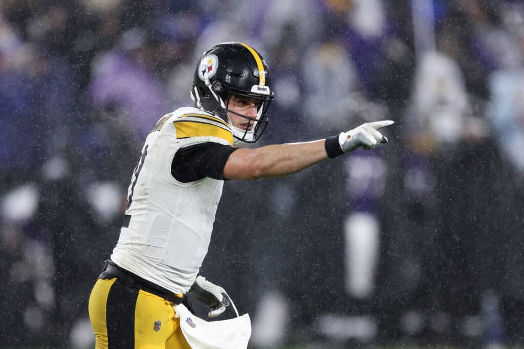 BALTIMORE, MARYLAND - JANUARY 06: Mason Rudolph #2 of the Pittsburgh Steelers celebrates after throwing a touchdown in the fourth quarter of a game against the Baltimore Ravens at M&T Bank Stadium on January 06, 2024 in Baltimore, Maryland.