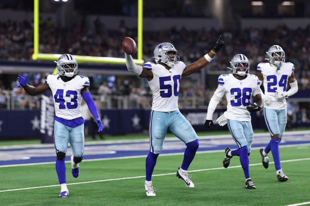 ARLINGTON, TEXAS - AUGUST 22: Shemar James #50 of the Dallas Cowboys celebrates with Kemon Hall #43, Alijah Clark #38, and Israel Mukuamu #24 after intercepting a pass during the second half of the NFL Preseason 2025 game against the Atlanta Falcons at AT&T Stadium on August 22, 2025 in Arlington, Texas.