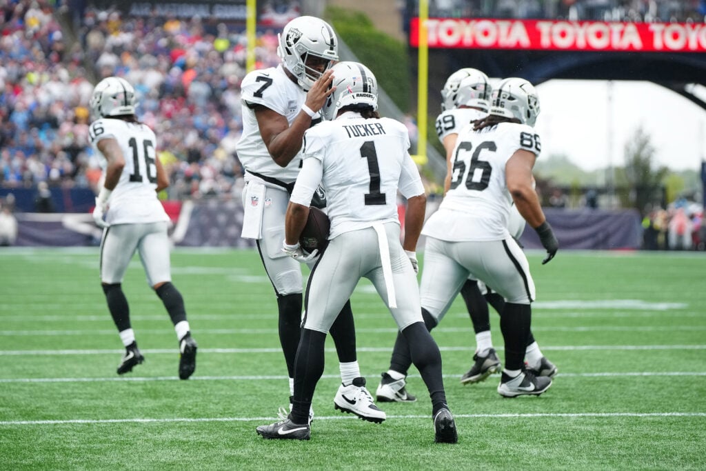 FOXBOROUGH, MASSACHUSETTS - SEPTEMBER 07: Tre Tucker #1 of the Las Vegas Raiders celebrates with Geno Smith #7 during the game against the New England Patriots at Gillette Stadium on September 07, 2025 in Foxborough, Massachusetts.