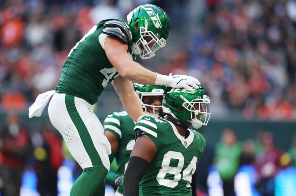 LONDON, ENGLAND - OCTOBER 12: Stone Smartt and Andrew Beck of New York Jets celebrate during the NFL 2025 game between Denver Broncos and New York Jets at Tottenham Hotspur Stadium on October 12, 2025 in London, England.